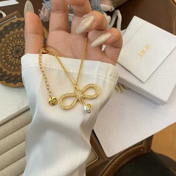 Dazzling and flawless golden bow - Picture 4 of 4